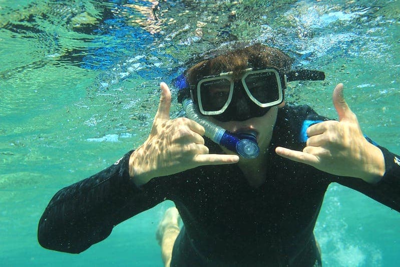 Student snorkelling during a school programme in Australia, enjoying outdoor experiences alongside everyday school life abroad.