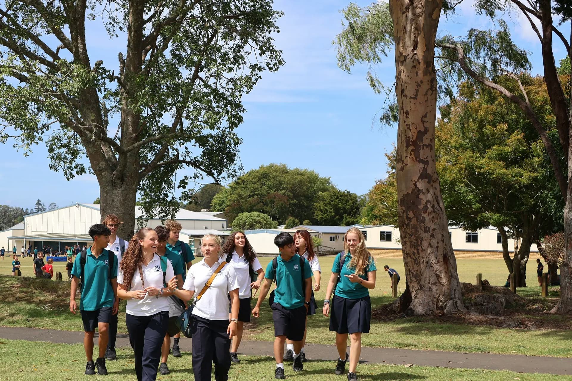Students walking across the campus of Kerikeri school during a school exchange year in New Zealand, showing everyday school life.