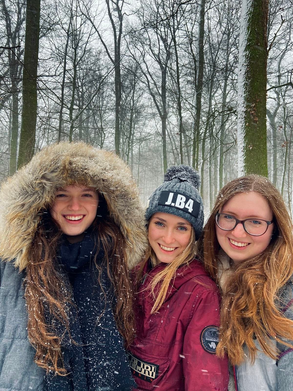 Students smiling outdoors during a school exchange programme in Germany, building friendships and sharing everyday life.