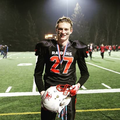 Student athlete in American football uniform in Canada, representing sports in an international school programme in Canada