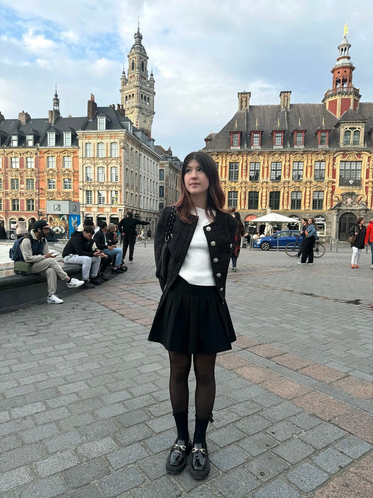 Student exploring the square in Lille, one of the most beautiful cities in northern France, during their study year abroad.