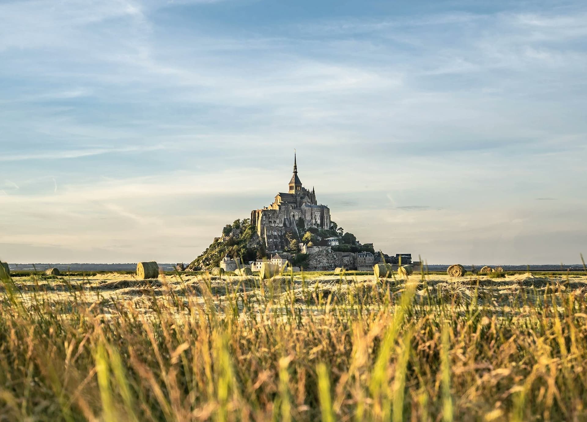 Student exploring Mont Saint-Michel, one of the natural and historical wonders of France, during their study year abroad.