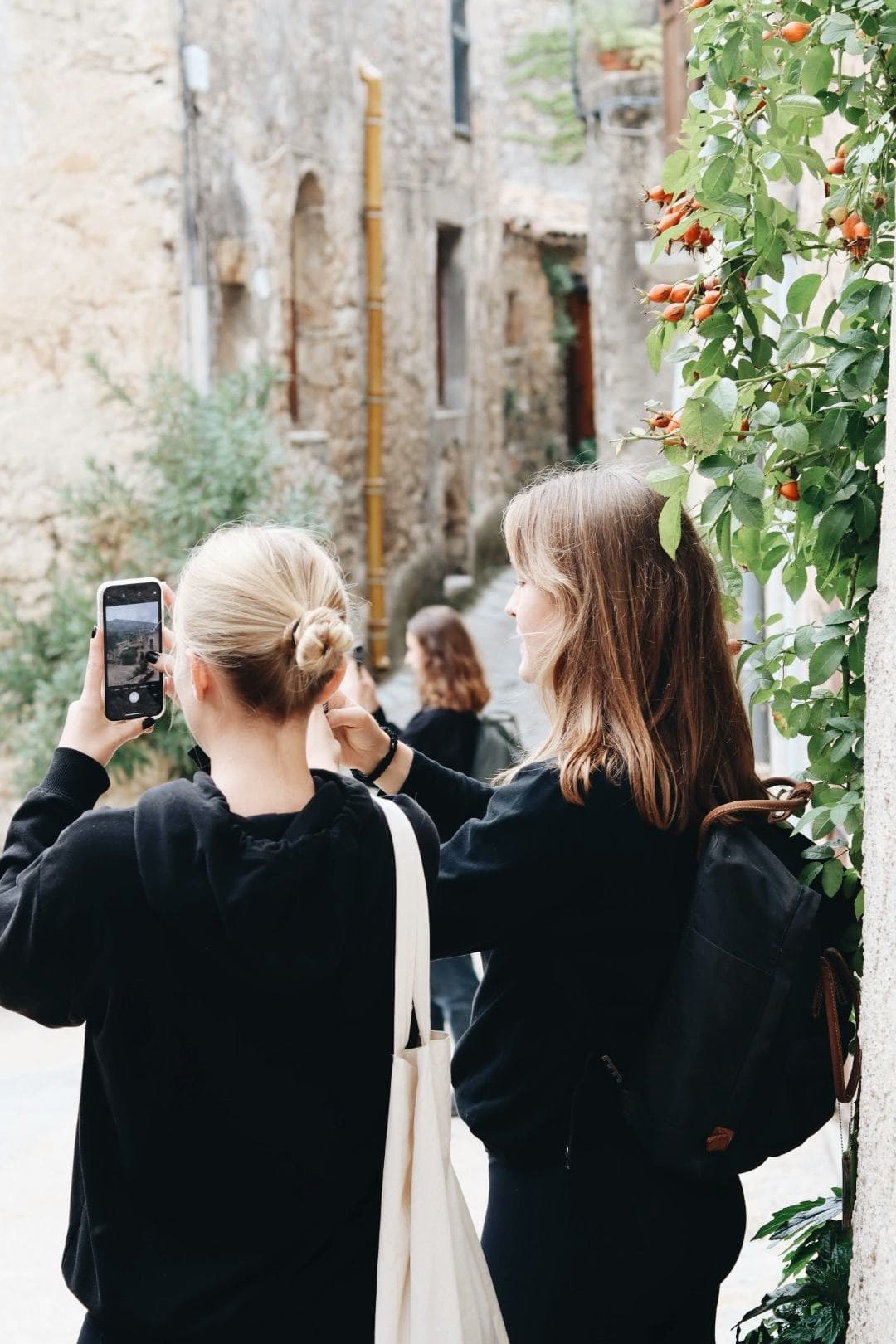 Two students exploring a picturesque French village, an unforgettable experience during their study year abroad in France.